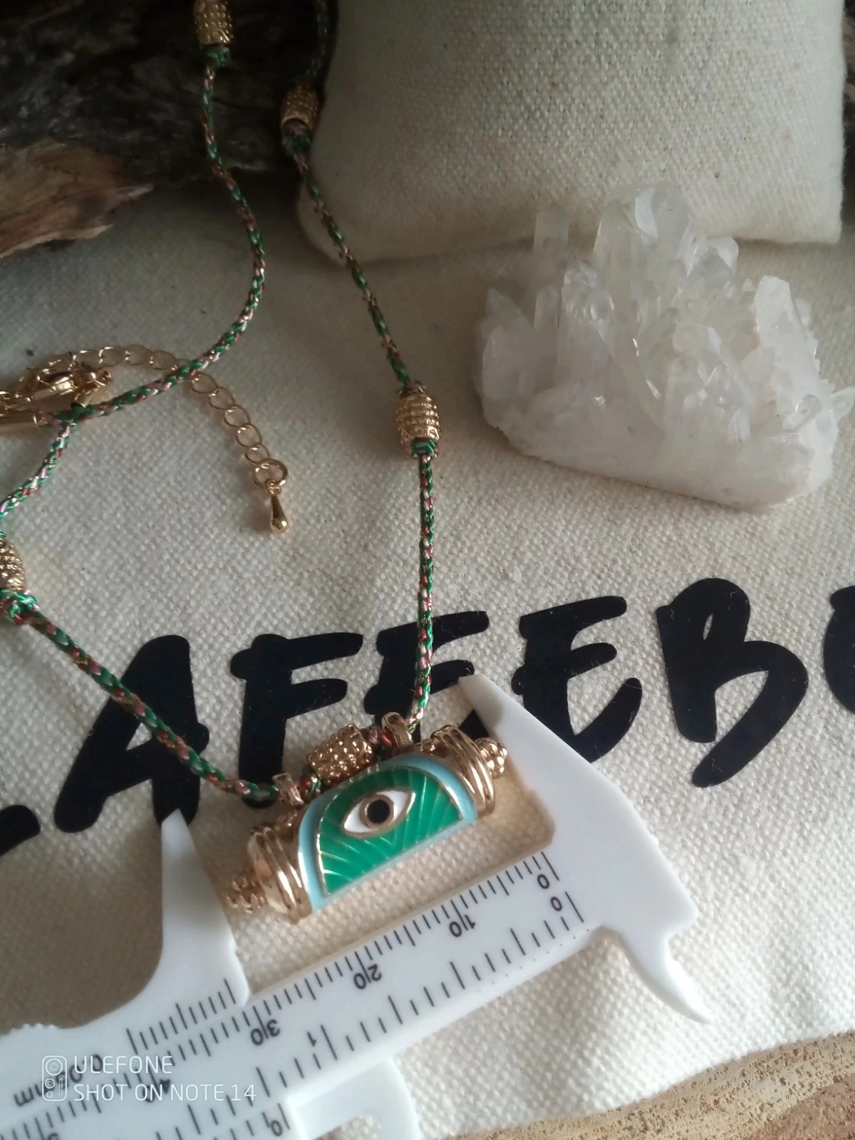 Collier talisman oeil et cordon en coton turquoise – photo 2
